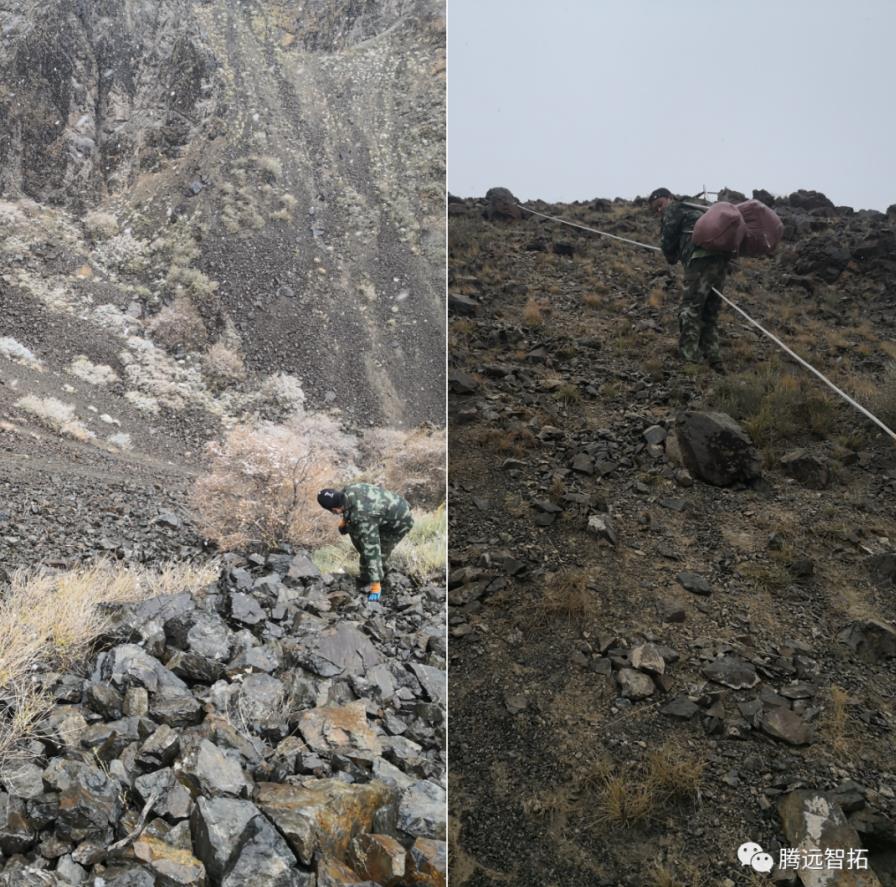 工作人员在陡峭的山上艰难的前进 工作人员在陡峭的山上艰难的前进