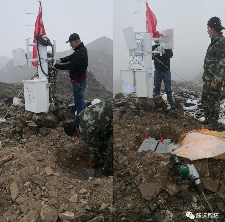 工作人员在山顶紧张安装中 工作人员在山顶紧张安装中